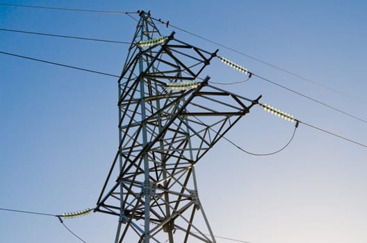 High-voltage insulators on a pillar of an electric main