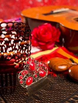 Classic spanish guitar with flamenco elements as comb and castanets