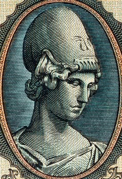 Godess Athena on 5000 Drachmai 1943 Banknote from Greece. The goddess of wisdom, peace, warfare, strategy, handicrafts and reason, shrewd companion of heroes and of heroic endeavor. She is the virgin patron of Athens, which built the Parthenon to worship her.