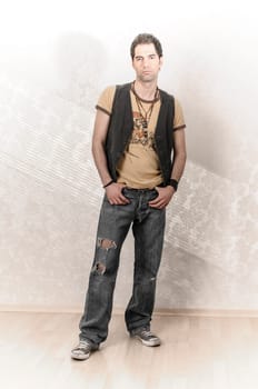 Young man with a Mediterranean look cool wearing casual clothes and posing in front of the camera.