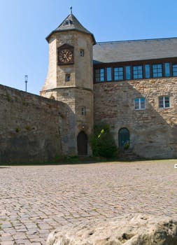 Courtyard of the castle Waldeck Edersse overlooking the tower with clock tower.