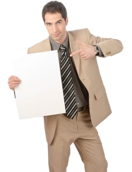 Young male businessman in light suit holding a blank sign in his hand, isolated against a white background
