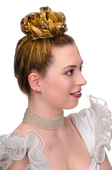 Portrait of a young bride with high hair und white bride dress.