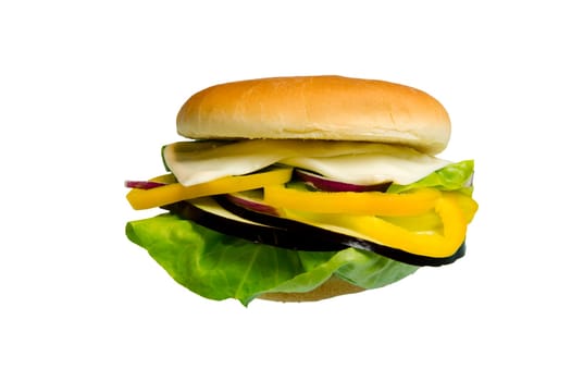 Veggie Sandwich made with lettuce, eggplant, yellow peppers cheese and onion isolated on white background.