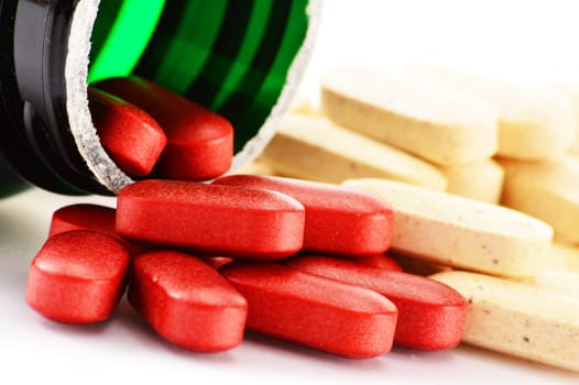 Composition with drug pills isolated on white background