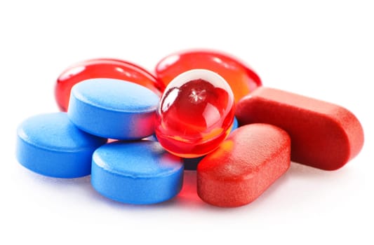 Composition with drug pills isolated on white background