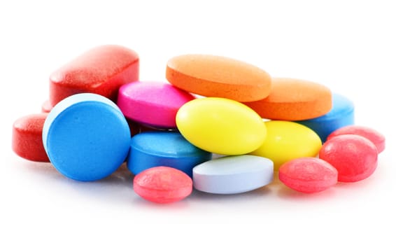 Composition with drug pills isolated on white background