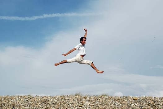 Man jumping on the beach