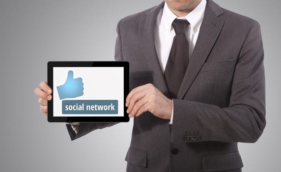 business man handing tablet with social network