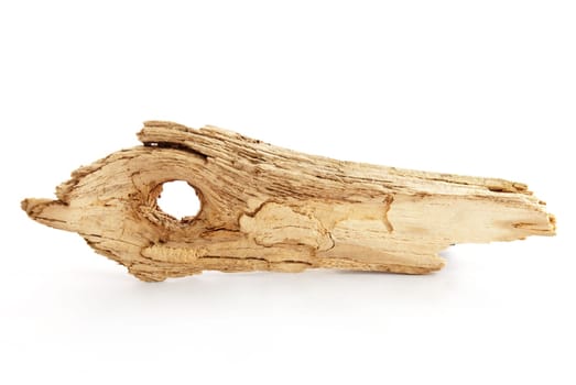 a pice of driftwood on white with copy space as marker tag