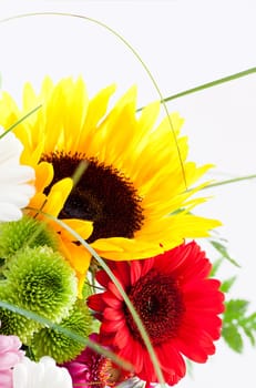 Small bouquet with sunflower against a white background