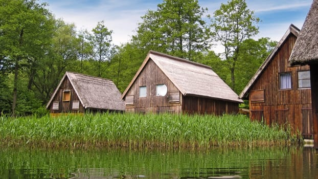 wooden houses by the water
