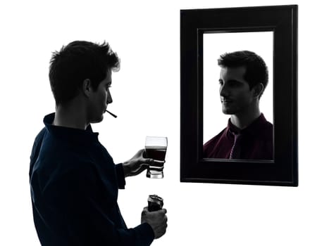 man in front of his mirror  in shadow  white background