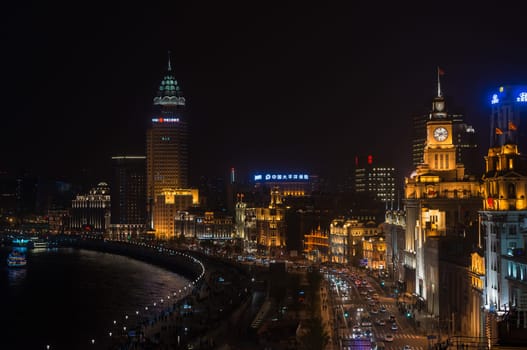 Shanghai, China - April 9, 2013:  the bund at night at the city of Shanghai in China on april 9th, 2013