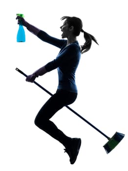 one caucasian woman maid dust cleaning flying broom in silhouette studio isolated on white background