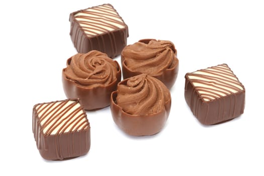 Chocolate pralines isolated on white background