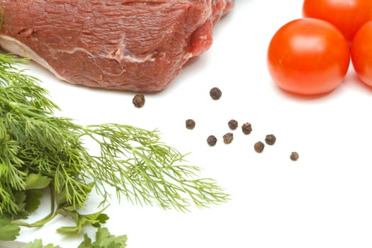 Piece of beef and vegetables isolated on white background