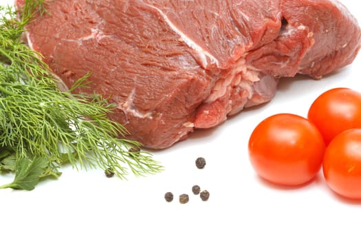 Piece of beef and vegetables isolated on white background