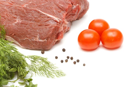 Piece of beef and vegetables isolated on white background