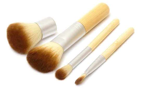 Makeup brushes on white background