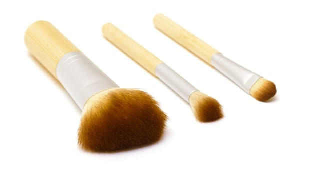 Makeup brushes on white background
