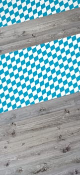 Wooden boards as text background with diamond pattern in blue and white