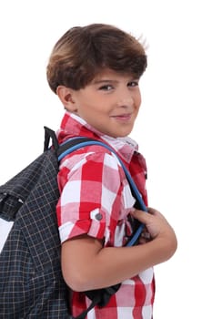 portrait of schoolboy with satchel
