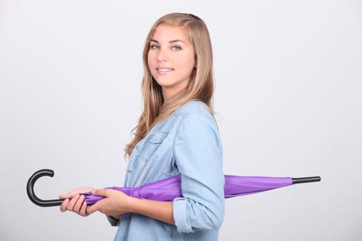 portrait of a young woman with umbrella