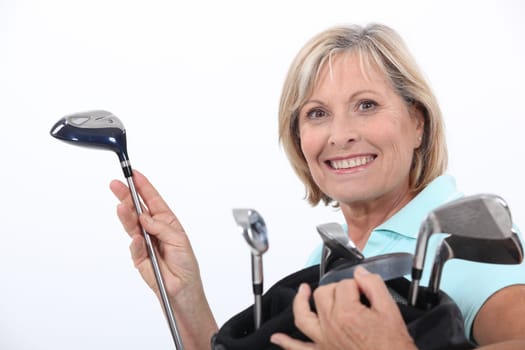 Woman with golf bag