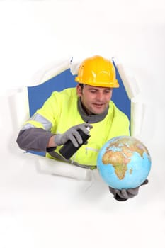 Construction worker with spray and globe