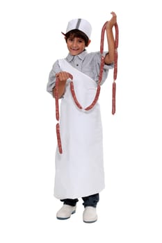 Boy dressed as a butcher
