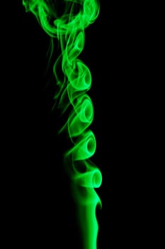 green smoke in black backgroun