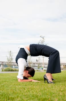 Flexibility - business woman outdoors