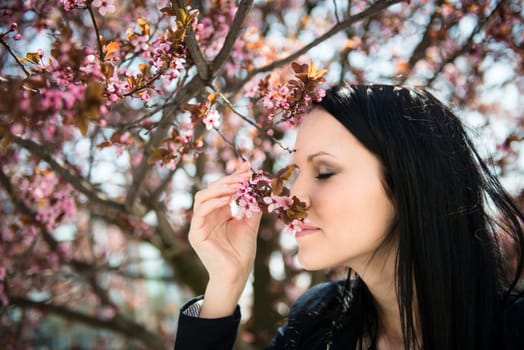 Portrait of young beautiful woman - outdoor with neutral background