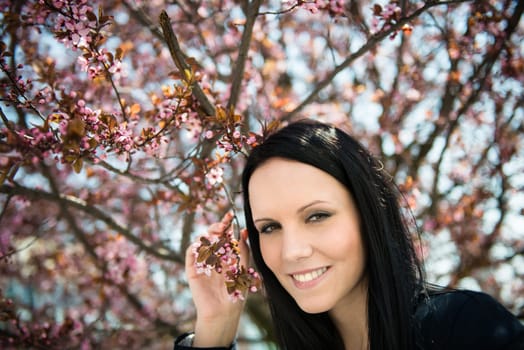 Portrait of young beautiful woman - outdoor with neutral background