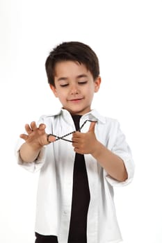 male child playing with rosary for pray