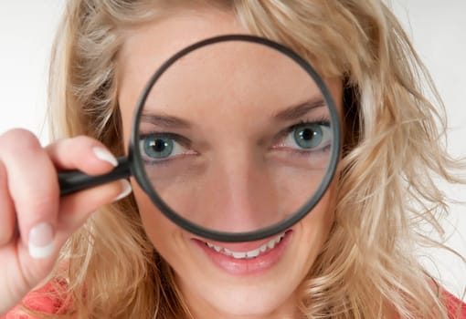 Woman with magnifying glass