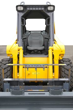 Skid steer front loader machine at construction site