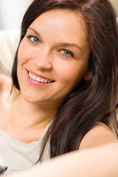 Portrait of beautiful young smiling woman
