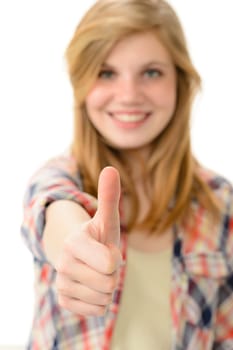 Young smiling girl showing thumbs up isolated on white background