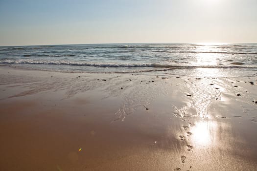 Sunset on Atlantic coast of Portugal at Praia da Areia Branca