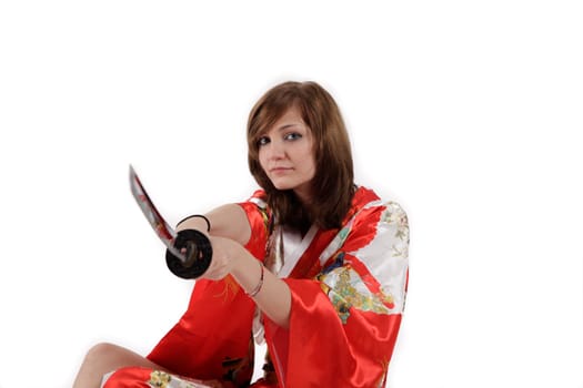 french young girl geisha in red silk kimono with japanese sword
