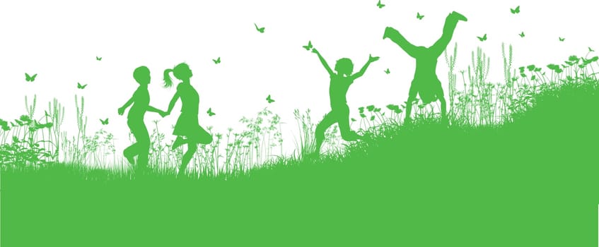 Children playing in grass and flowers