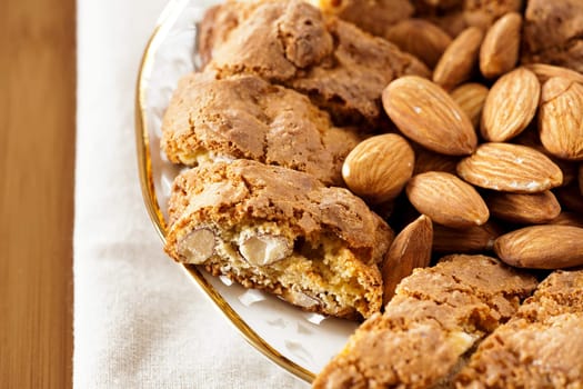 Cantuccini pastry with almond kernels on a plate
