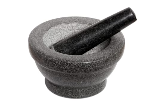 Heavy granite mortar insulated against a white background