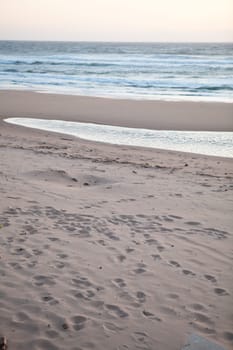 Calm and serene beach scene in late evening