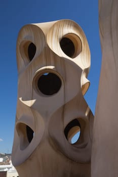 BARCELONA. APR 24: Casa Mila. On the rooftop there are twenty-eight chimneys in several groupings  twisted so that the smoke came out better.  2013 in Barcelona, Spain.
