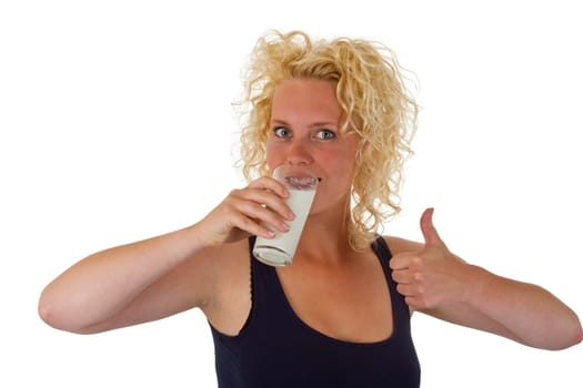 Young woman with glass of milk exempted on white background