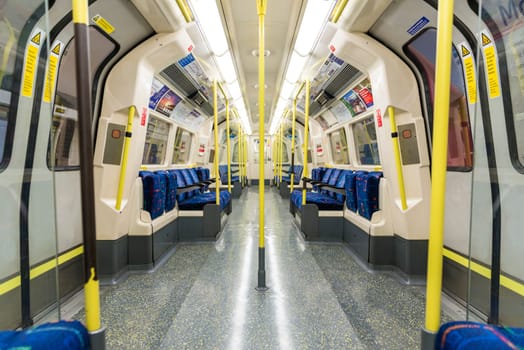 LONDON, UK - APRIL 07: Interior of empty Northern line underground train showing access doors. April 07, 2013 in London.