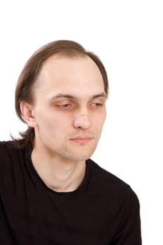 The man with a nose stuck with a plaster